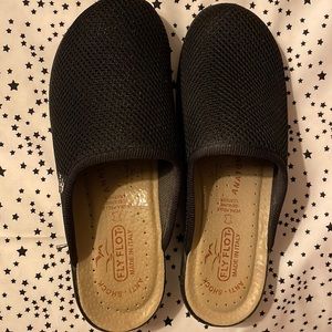 Fly Flots black mesh cushioned clog.